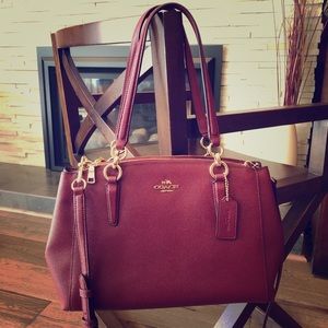 Authentic Coach satchel with long strap, deep red